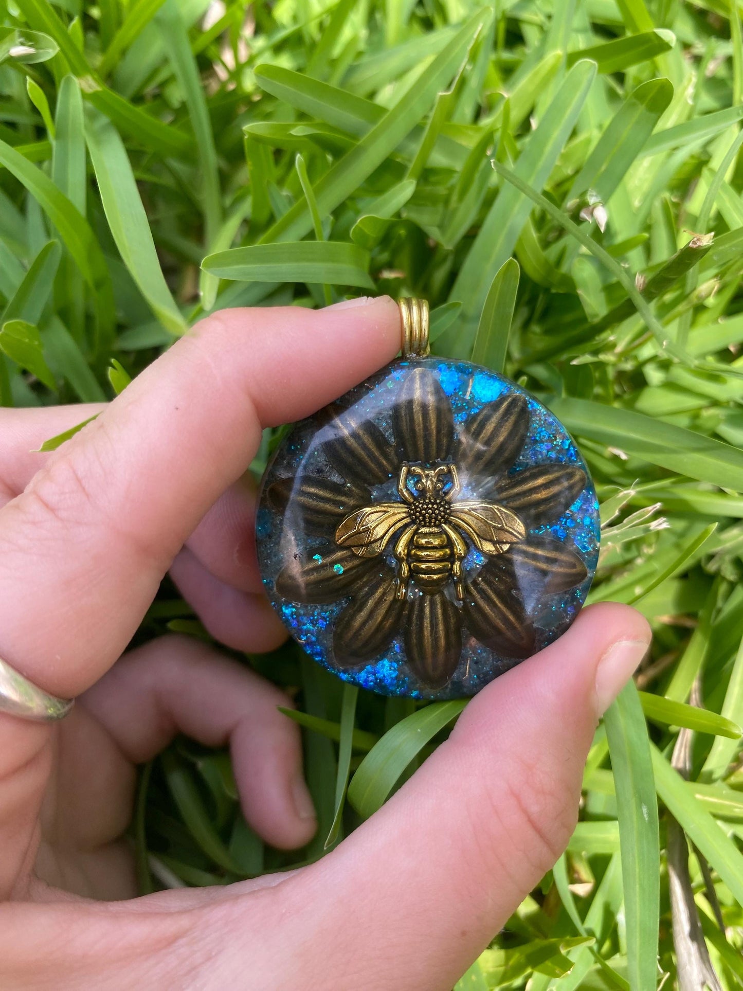 Bee layered over flower. Orgone Pendant Necklace. Made w Blue Apatite, & Elite Shungite. Tensor Ring. Powerful. EMF Protection.