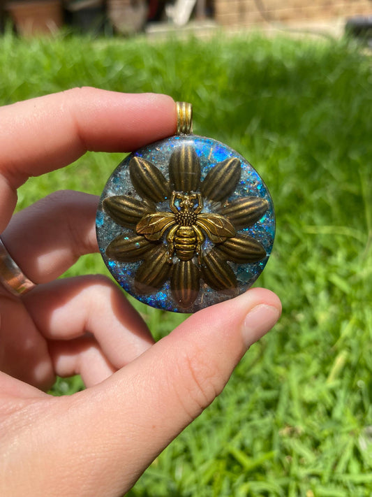 Bee layered over flower. Orgone Pendant Necklace. Made w Blue Apatite, & Elite Shungite. Tensor Ring. Powerful. EMF Protection.